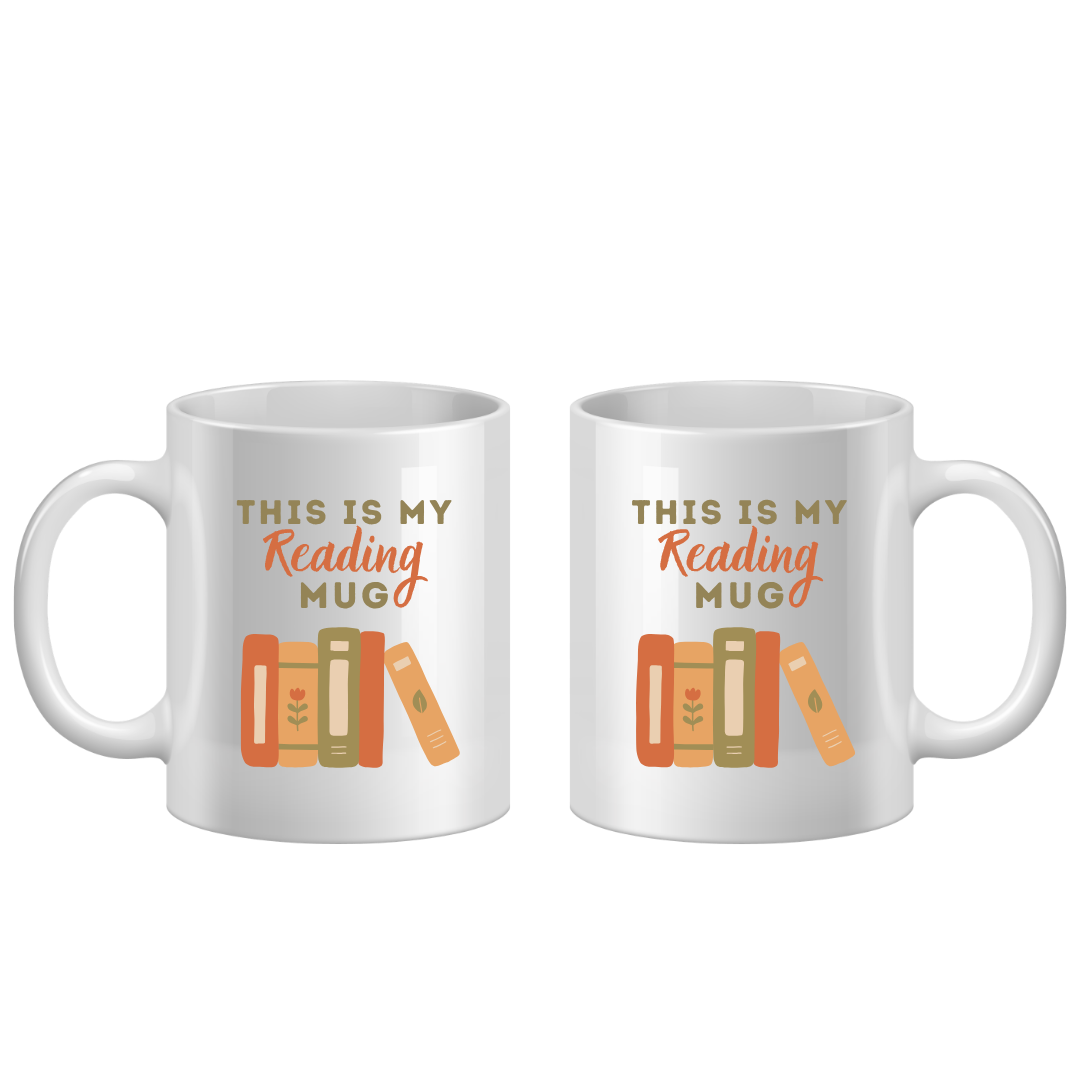 Two white mugs with 'This is my reading mug' text and book illustrations on a white background