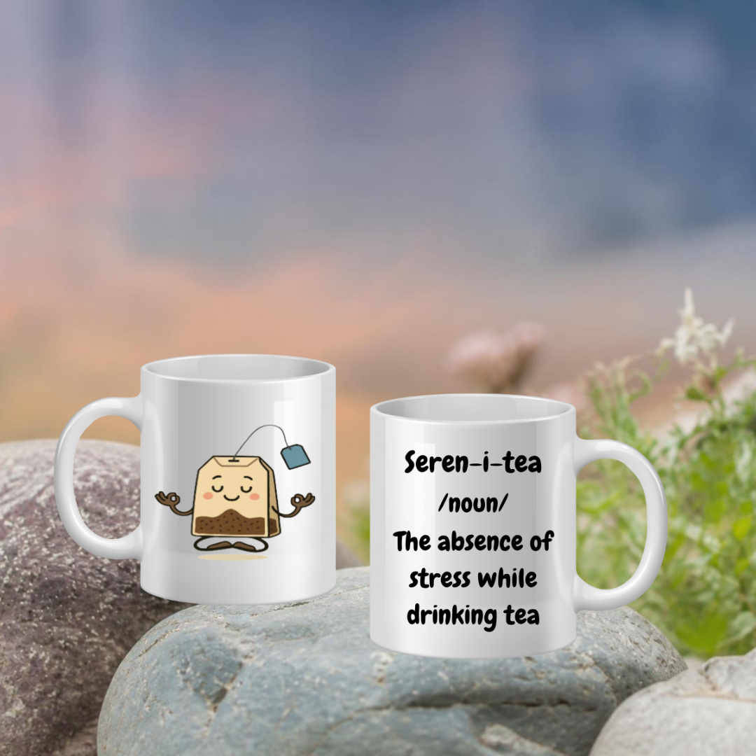 Two mugs with tea-themed designs on a blurred natural background